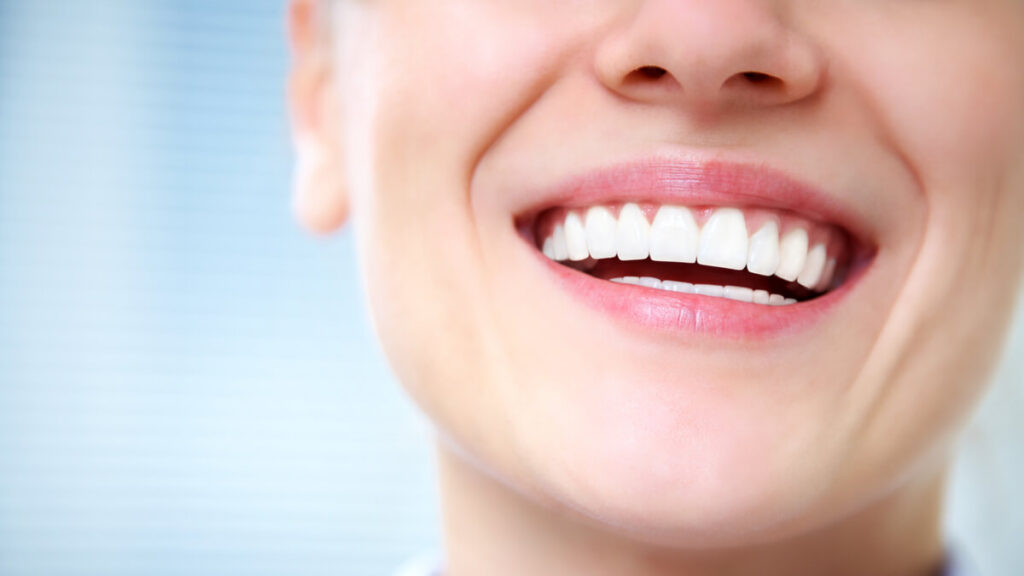 closeup-teeth-laughing-woman-wide