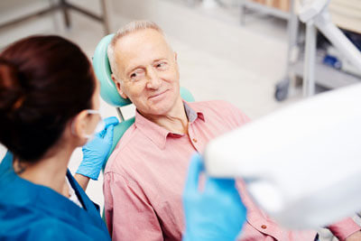 man-talking-with-dental-technician